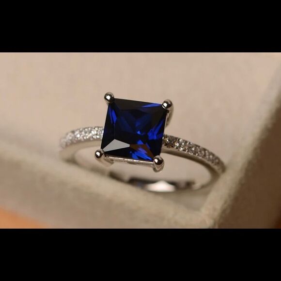 Jewelry - Sterling silver princess cut blue sapphire and cubic zirconia ring. Sz: 10